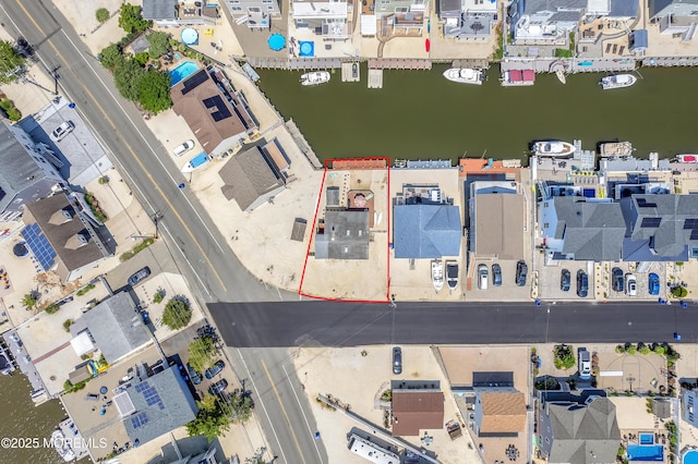 8 Ralph Ln, Beach Haven West, NJ 08050 - aerial perspective of suburban area featuring property boundaries highlighted and a large body of water