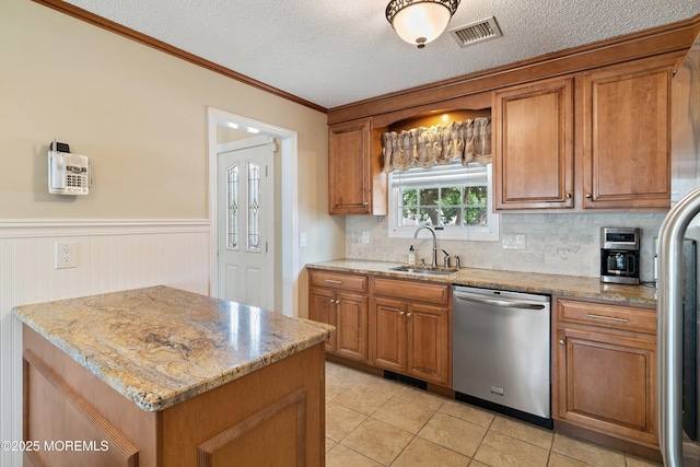 54 Storm Jib Ct, Bayville, NJ 08721 - kitchen featuring dishwasher, brown cabinets, tasteful backsplash, light tile patterned floors, and crown molding