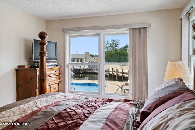 54 Storm Jib Ct, Bayville, NJ 08721 - bedroom featuring a textured ceiling