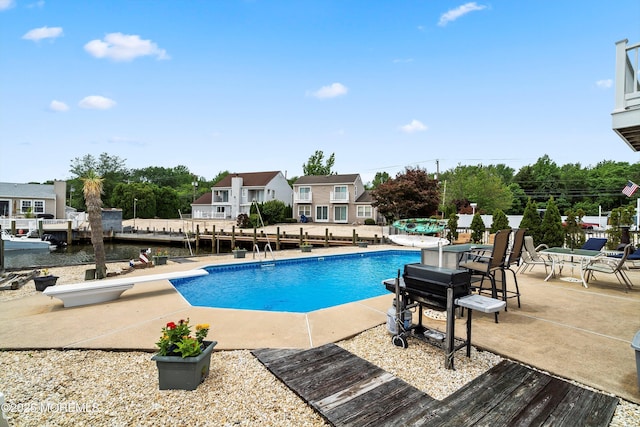 54 Storm Jib Ct, Bayville, NJ 08721 - view of pool with a diving board and a patio area