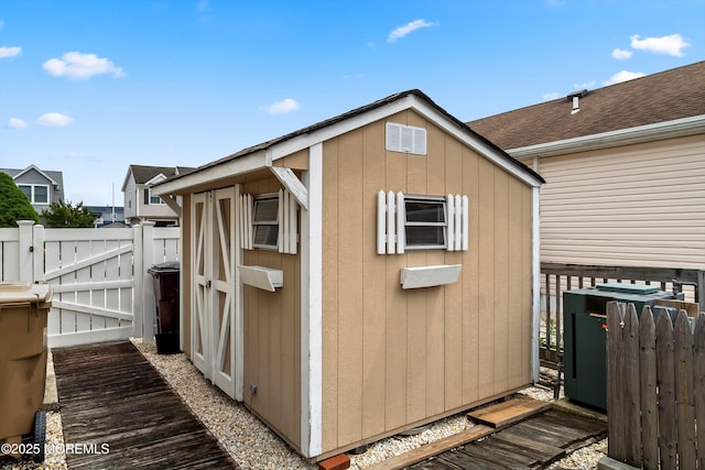 54 Storm Jib Ct, Bayville, NJ 08721 - view of shed with a gate