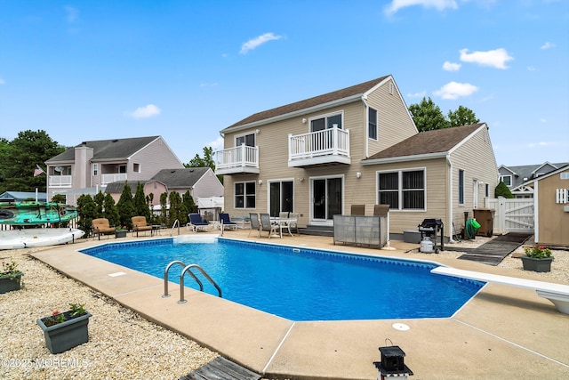 54 Storm Jib Ct, Bayville, NJ 08721 - view of swimming pool featuring a gate, a patio area, a diving board, and a grill