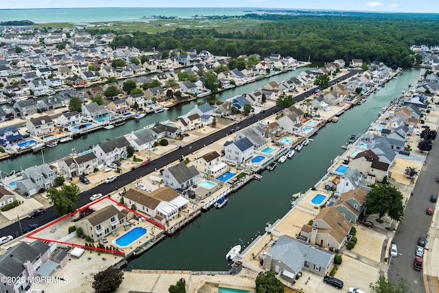 54 Storm Jib Ct, Bayville, NJ 08721 - aerial perspective of suburban area with property boundaries highlighted and a large body of water