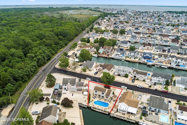 54 Storm Jib Ct, Bayville, NJ 08721 - aerial view of residential area with property boundaries highlighted and a nearby body of water