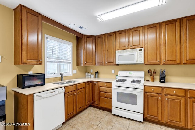 35 Kings N Rd, Jackson, NJ 08527 - kitchen featuring white appliances, brown cabinets, light countertops, and light tile patterned flooring