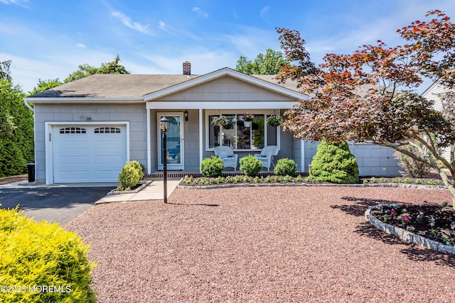 23 Auburn Rd, Toms River, NJ 08757 - ranch-style home with covered porch, an attached garage, asphalt driveway, a chimney, and a shingled roof