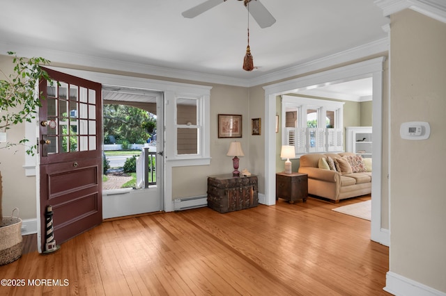 340 Main Ave, Bay Head, NJ 08742 - entrance foyer with baseboard heating, hardwood / wood-style floors, healthy amount of natural light, and crown molding