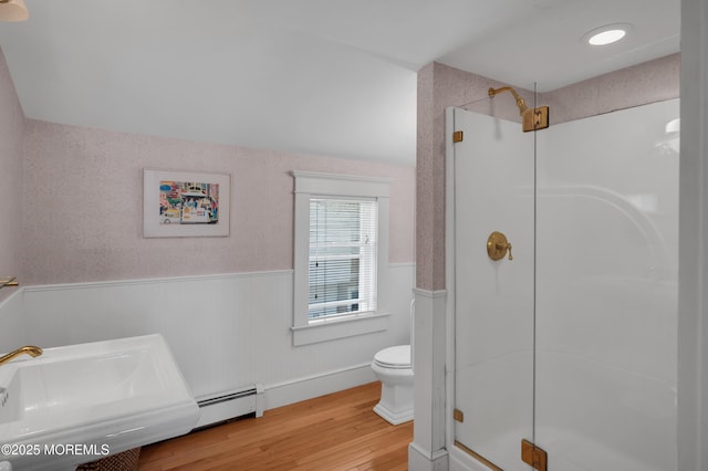 340 Main Ave, Bay Head, NJ 08742 - bathroom featuring wood finished floors, a wainscoted wall, a stall shower, and baseboard heating