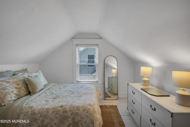 340 Main Ave, Bay Head, NJ 08742 - bedroom with lofted ceiling and light tile patterned floors