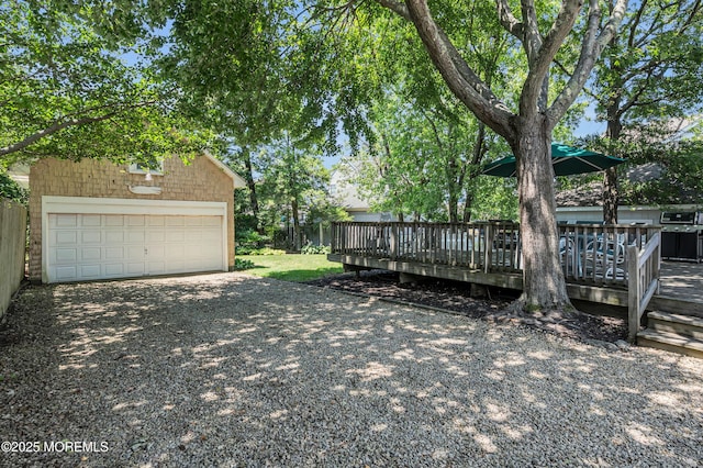 340 Main Ave, Bay Head, NJ 08742 - view of yard featuring an outdoor structure, a deck, and driveway