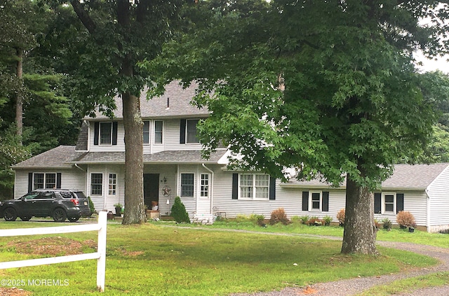 74 Squankum Rd, Tinton Falls, NJ 07724 - traditional-style home featuring a front lawn and roof with shingles