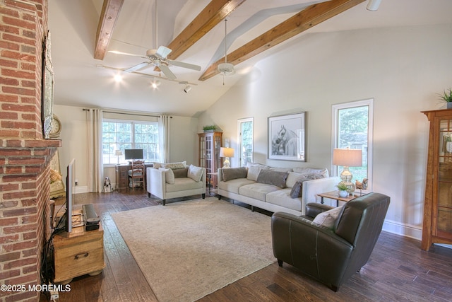 74 Squankum Rd, Tinton Falls, NJ 07724 - living room featuring beam ceiling, track lighting, dark wood-style floors, a ceiling fan, and high vaulted ceiling