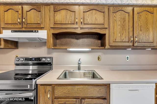 27 Greenhill Dr, Brick, NJ 08724 - kitchen with stainless steel range with electric cooktop, under cabinet range hood, white dishwasher, and light countertops