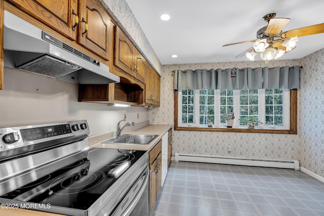 27 Greenhill Dr, Brick, NJ 08724 - kitchen featuring electric stove, under cabinet range hood, wallpapered walls, a baseboard heating unit, and ceiling fan