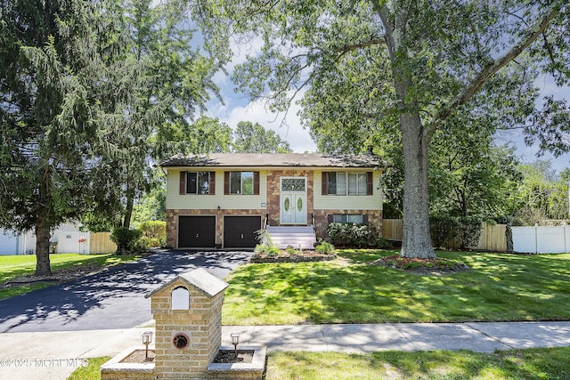17 Yorkshire Dr, Jackson, NJ 08527 - bi-level home with stone siding, concrete driveway, and a garage