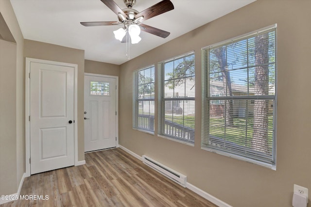 9 Deerfield Dr Unit D, Whiting, NJ 08759 - foyer entrance featuring baseboard heating, light wood finished floors, and a ceiling fan