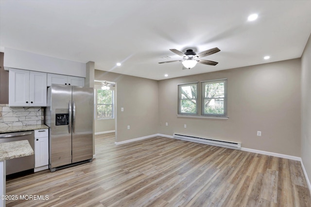 9 Deerfield Dr Unit D, Whiting, NJ 08759 - kitchen with stainless steel appliances, a baseboard radiator, a ceiling fan, backsplash, and recessed lighting