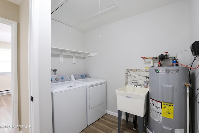 9 Deerfield Dr Unit D, Whiting, NJ 08759 - laundry room featuring water heater, attic access, wood finished floors, independent washer and dryer, and a baseboard heating unit