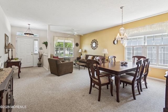 18 Osprey Pl, Barnegat, NJ 08005 - dining space with light colored carpet, a chandelier, ceiling fan, and a textured ceiling