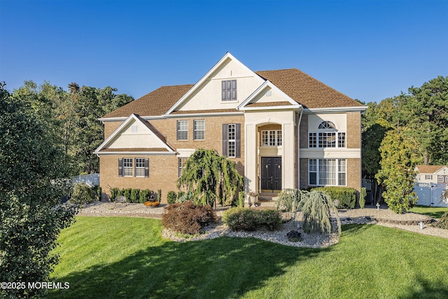 28 Stonehenge Ct, Jackson, NJ 08527 - georgian-style home with a front yard and stucco siding