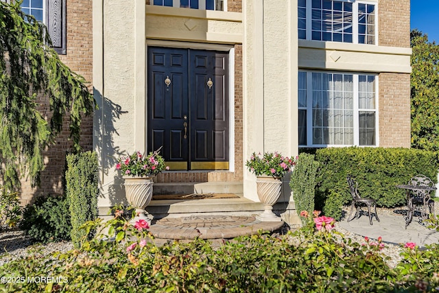 28 Stonehenge Ct, Jackson, NJ 08527 - entrance to property with brick siding and stucco siding