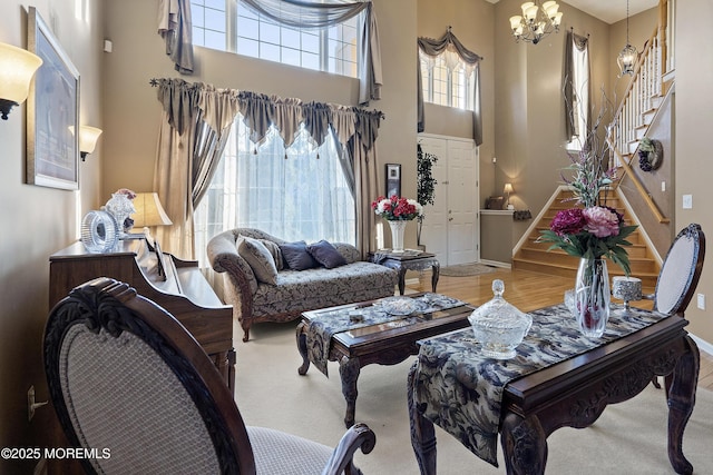 28 Stonehenge Ct, Jackson, NJ 08527 - living area featuring a towering ceiling, stairway, and a chandelier