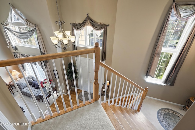 28 Stonehenge Ct, Jackson, NJ 08527 - stairs with a chandelier and wood finished floors