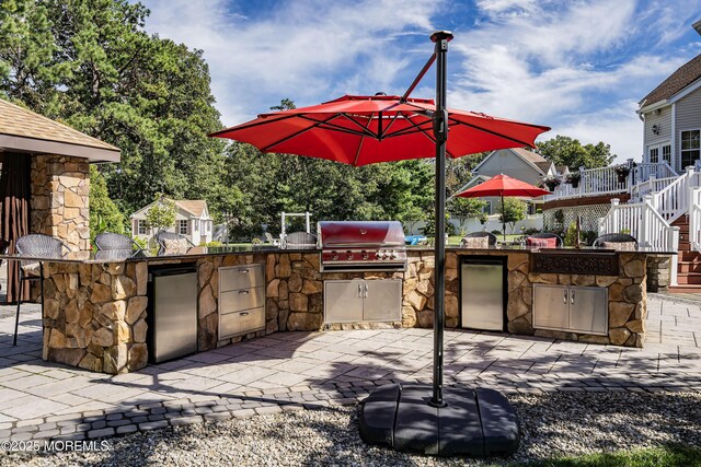 28 Stonehenge Ct, Jackson, NJ 08527 - view of patio featuring area for grilling, stairs, a deck, and an outdoor bar