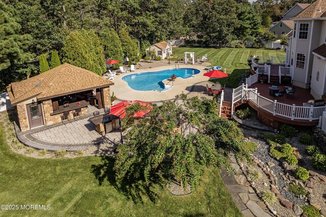 28 Stonehenge Ct, Jackson, NJ 08527 - outdoor pool featuring a wooden deck, a patio area, a yard, and area for grilling