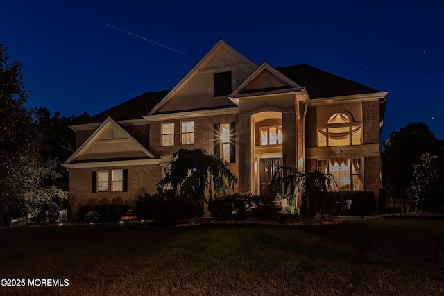28 Stonehenge Ct, Jackson, NJ 08527 - view of front of property with brick siding and a lawn