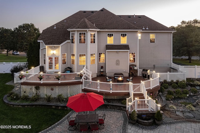 28 Stonehenge Ct, Jackson, NJ 08527 - back of house with a deck, a fenced backyard, a patio area, and outdoor dining space
