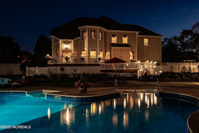 28 Stonehenge Ct, Jackson, NJ 08527 - pool at twilight with a deck and a patio