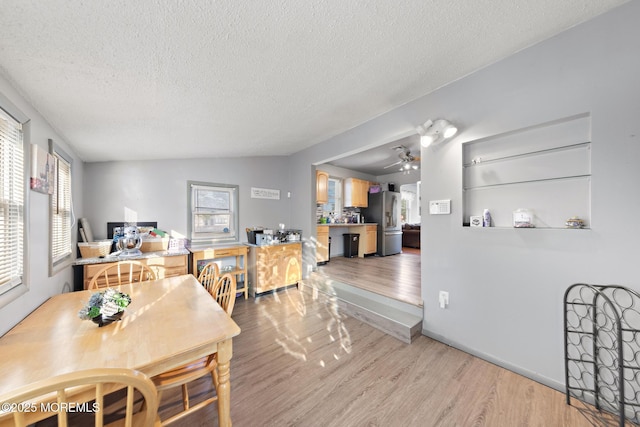 302 Kadlubeck Way, Little Egg Harbor, NJ 08087 - dining space with healthy amount of natural light, ceiling fan, light wood-type flooring, and a textured ceiling
