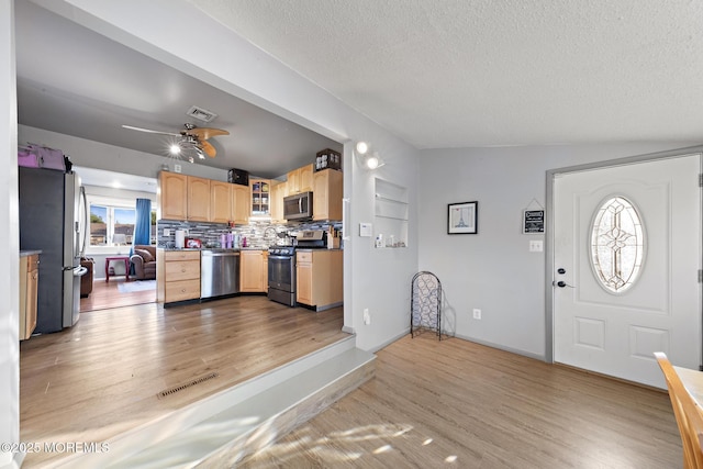 302 Kadlubeck Way, Little Egg Harbor, NJ 08087 - kitchen featuring stainless steel appliances, light brown cabinets, a textured ceiling, a ceiling fan, and light wood-style flooring
