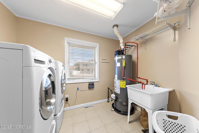 302 Kadlubeck Way, Little Egg Harbor, NJ 08087 - laundry room with gas water heater, independent washer and dryer, and light tile patterned flooring