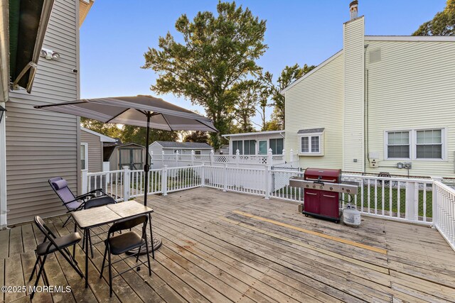 302 Kadlubeck Way, Little Egg Harbor, NJ 08087 - deck featuring a shed, area for grilling, and outdoor dining area