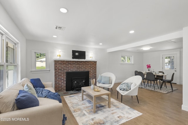 1822 Deerhead Lake Dr, Forked River, NJ 08731 - living room featuring light wood-style floors, plenty of natural light, recessed lighting, and a fireplace