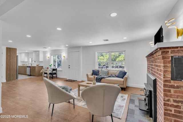 1822 Deerhead Lake Dr, Forked River, NJ 08731 - living room featuring recessed lighting and a fireplace