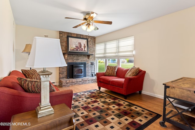 16 Saint Paul Pl, Manchester, NJ 08759 - living room featuring a ceiling fan, wood finished floors, and a baseboard heating unit