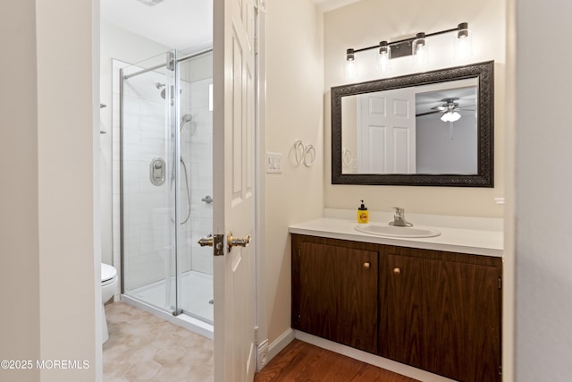 16 Saint Paul Pl, Manchester, NJ 08759 - bathroom featuring a stall shower, vanity, and ceiling fan