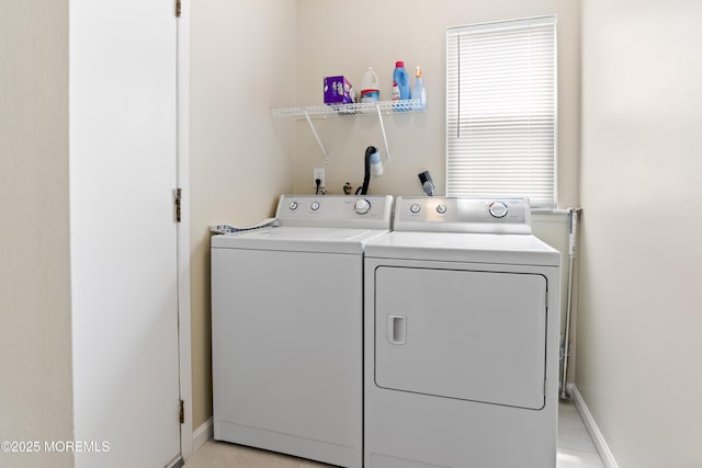 16 Saint Paul Pl, Manchester, NJ 08759 - washroom featuring washing machine and clothes dryer and light tile patterned floors