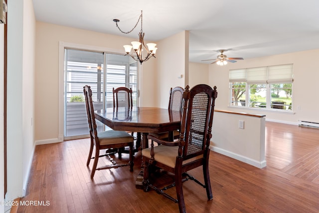 16 Saint Paul Pl, Manchester, NJ 08759 - dining area featuring hardwood / wood-style flooring, a chandelier, ceiling fan, and baseboard heating