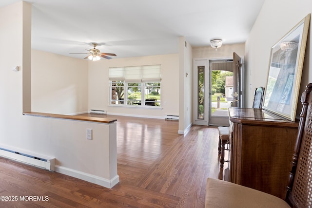 16 Saint Paul Pl, Manchester, NJ 08759 - foyer entrance with baseboard heating, wood finished floors, and a ceiling fan
