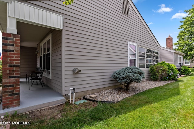 16 Saint Paul Pl, Manchester, NJ 08759 - view of side of home featuring a lawn