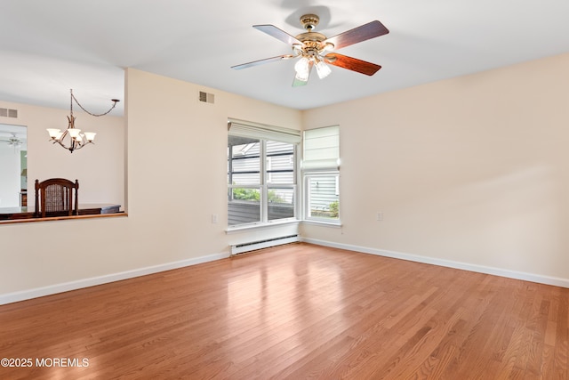 16 Saint Paul Pl, Manchester, NJ 08759 - empty room with baseboard heating, light wood-style floors, a chandelier, and ceiling fan