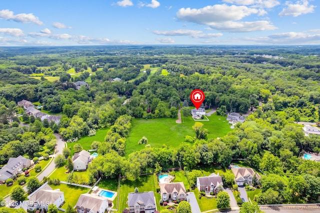 67-69 School Rd E, Marlboro, NJ 07746 - aerial perspective of suburban area with a heavily wooded area