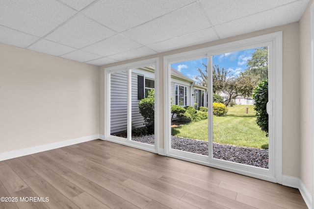 377 Old Nassau Rd Unit 377B, Monroe, NJ 08831 - spare room featuring a paneled ceiling and light wood-style floors