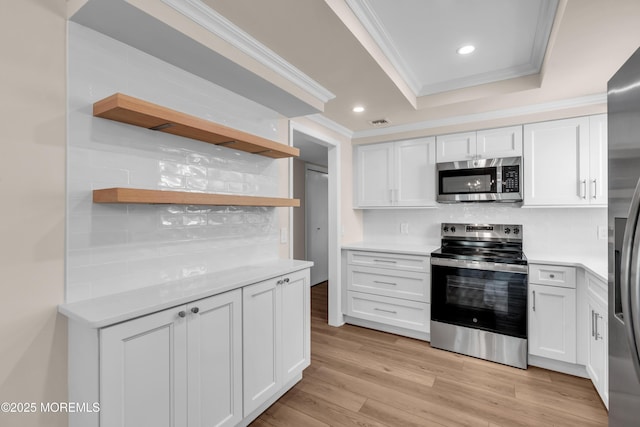 377 Old Nassau Rd Unit 377B, Monroe, NJ 08831 - kitchen with stainless steel appliances, open shelves, crown molding, white cabinets, and tasteful backsplash