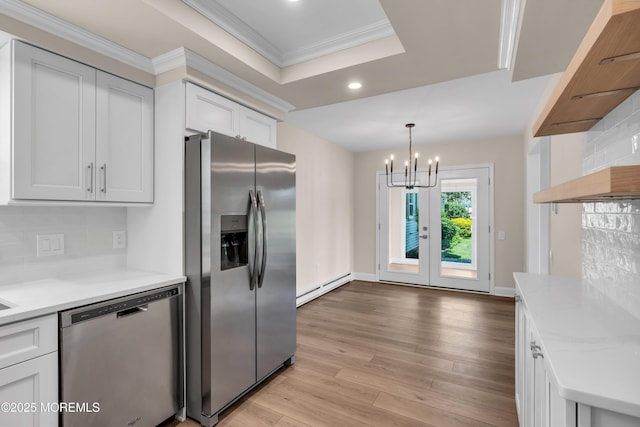377 Old Nassau Rd Unit 377B, Monroe, NJ 08831 - kitchen with appliances with stainless steel finishes, a baseboard radiator, recessed lighting, ornamental molding, and decorative backsplash