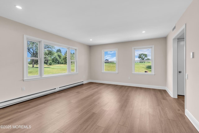 377 Old Nassau Rd Unit 377B, Monroe, NJ 08831 - unfurnished room featuring a baseboard radiator, plenty of natural light, light wood finished floors, and recessed lighting